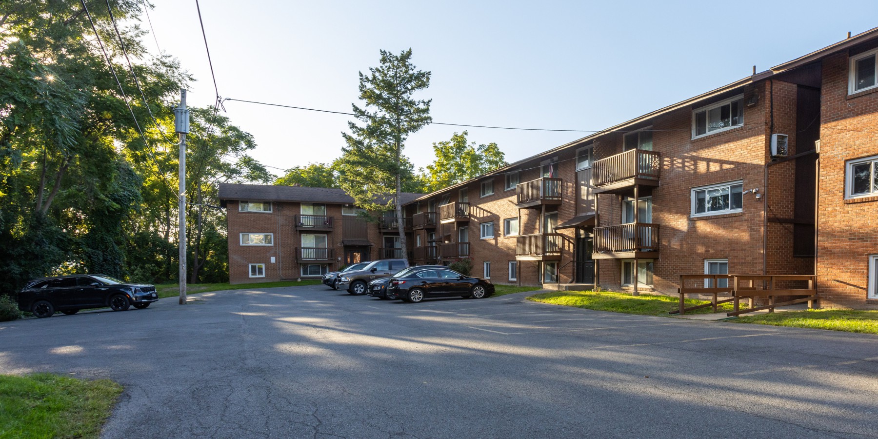 Brick buildings with balconies at 138 Jamesville Avenue, Carriage House Apartments, Syracuse NY
