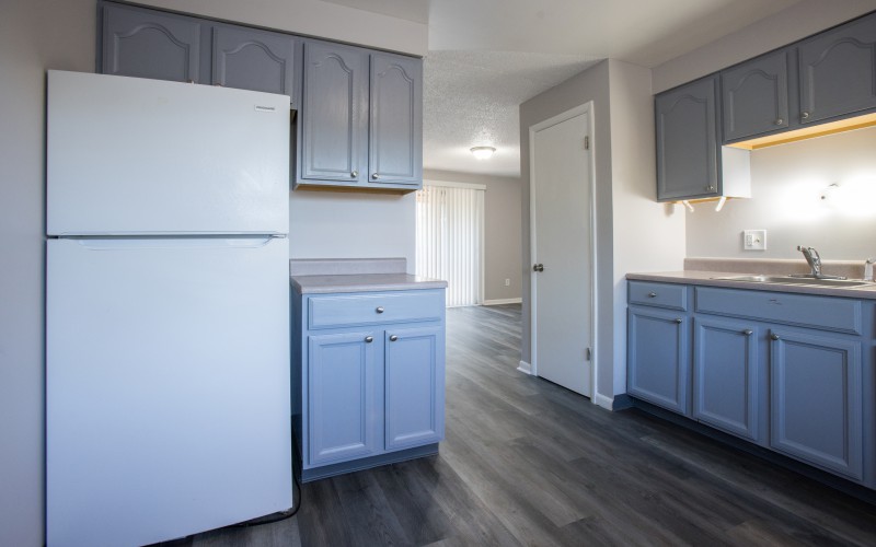Similar apartment: kitchen opening onto the living area at Carriage House Apartments, Syracuse NY